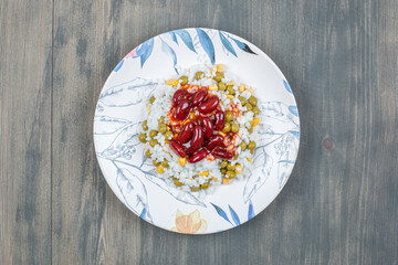 Delicious kidney beans with corns , peas and rice