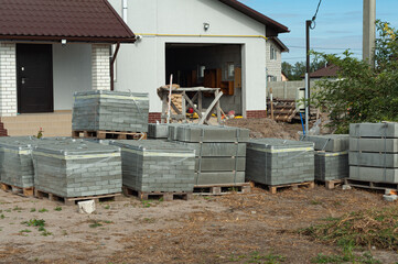 Building site of a house under construction made from white foam concrete blocks. Building new frame of home.