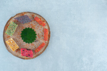  delicious assortment of turkish delights on the board,on the marble background
