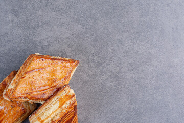 Homemade crispy pastries on marble background