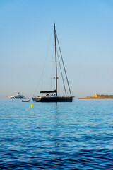 Moored botas in front of a beach