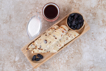 Homemade pancakes roll with raisin and condensed milk