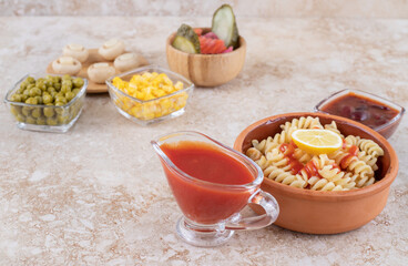 Delicious pasta with mushrooms on a marble background