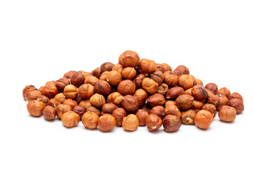 Heap of hazelnuts close-up. Peeled nuts. Hazelnut isolated on white background.