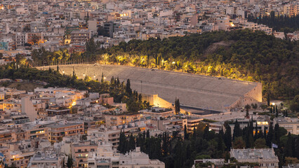 Obraz premium Panathenaic Stadium by night in Athens , Greece