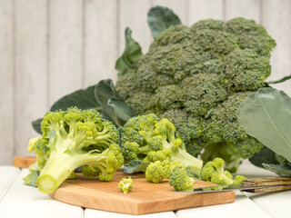 Lots of broccoli for diet and healthy eating. Fresh green broccoli on the table. Organic products