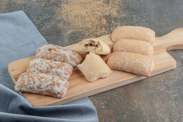 Bundle of russian cookies on a board on marble background