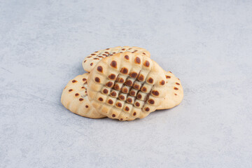 Small bundle of cookies on marble background