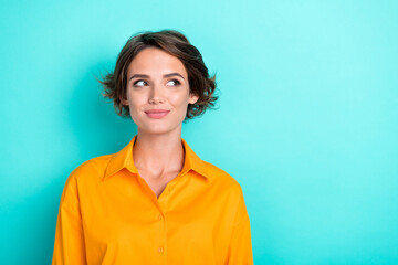 Closeup photo of young gorgeous pretty woman wear shirt look empty space have idea new plan how get more money isolated on cyan color background