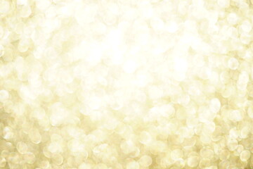 Shiny light blurred gold background with bubbles