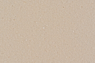 Beige color cardboard recycled paper, tileable texture, image width 20cm