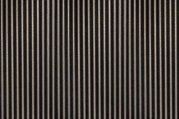 Corrugated cardboard texture in black stripes.