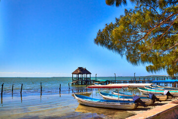 boats and pier with blue sea on isla aguada campeche 