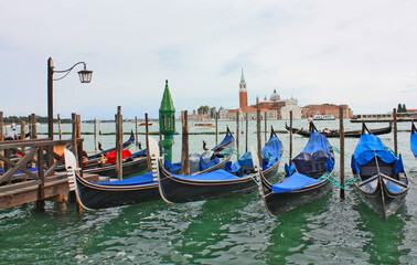 Obraz na płótnie Canvas Cityscapes with gondolas in front of San Giorgio Maggiore church in Venice, Italy 