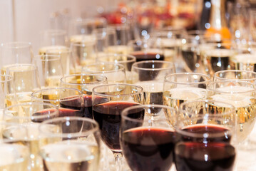 Fototapeta na wymiar Glass goblets with wine at an event close-up