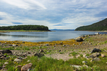 The picturesque coast and islands of the Kandalaksha Bay of the White Sea. Good weather