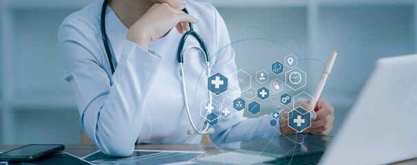 Medicine doctor using digital healthcare and network connection on hologram modern virtual screen...