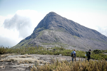 Fototapeta premium Mountaineer climbing brazil's highest peaks in the mountains with extensive hiking and backpacking. 