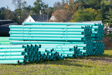 Polyethylene pipes HDPE water, lying on the pavement lie on the ground