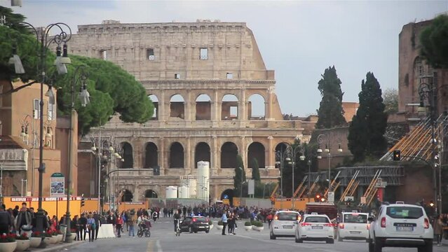 A View of the Roman Colosseum from the Via dei Fori Imperiali  in the Centre of the City of Rome, Italy.