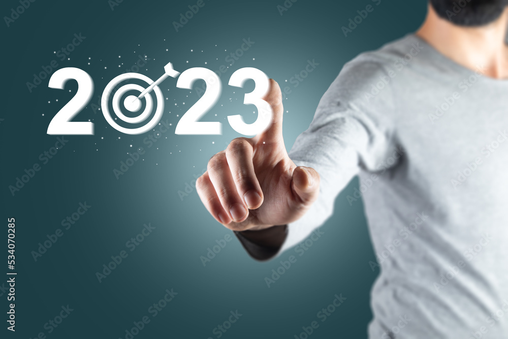 Poster 2023 and target icon on virtual screen.