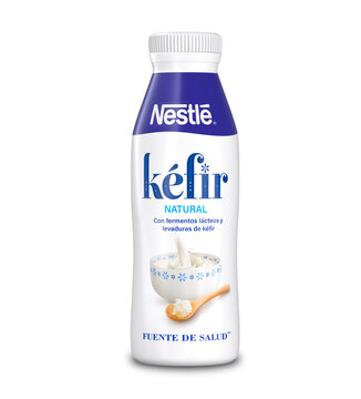Malaga, Spain - September 28, 2022: Nestle, 500g plain kefir bottle. White background