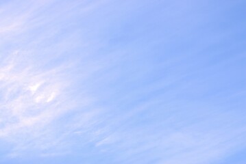 Blue sky lined with white lines of clouds Background Banner Screen saver on the monitor.