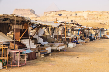 Empty vendor souvenir stalls at the Pyramids in Giza, Egypt.