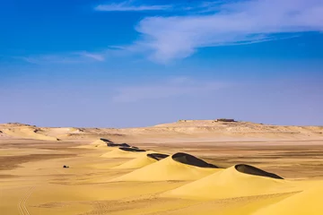 Fotobehang Sand dunes in the desert at Wadi el-Hitan paleontological site. © emily_m_wilson