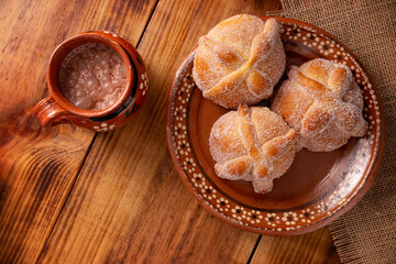 Pan de Muerto. Typical Mexican sweet bread that is consumed in the season of the day of the dead. It is a main element in the altars and offerings in the festivity of the day of the dead.