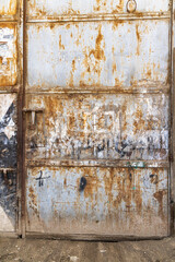 Rusted metal door on a building in Cairo.