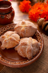 Pan de Muerto. Typical Mexican sweet bread that is consumed in the season of the day of the dead. It is a main element in the altars and offerings in the festivity of the day of the dead.