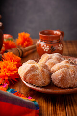 Pan de Muerto. Typical Mexican sweet bread that is consumed in the season of the day of the dead. It is a main element in the altars and offerings in the festivity of the day of the dead.