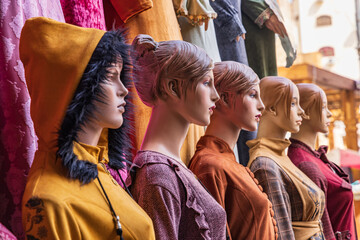 Fototapeta na wymiar Mannequins in dresses at a clothing store in Luxor.
