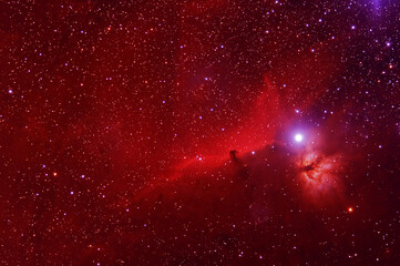 Beautiful red space nebula. Elements of this image furnished by NASA