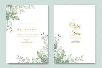 Watercolor wedding invitation card in green leaves 