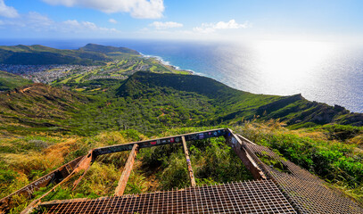 Aerial view of the Koko crater and of the Pacific Ocean on O'ahu island in Hawaii from the top of the volcano - Old steel mesh floor as part of an ancient mining site on a volcano