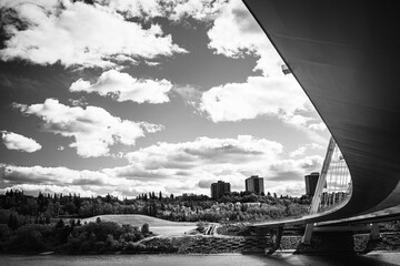 Black and white photo of suspension bridge and river in Edmonton, Alberta, Canada