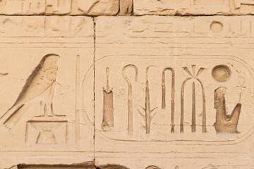 Hieroglyphs on a wall at the Karnak Temple complex in Luxor.