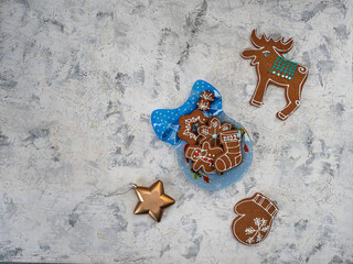 Christmas gingerbread cookies with colorful glaze and a Christmas plate