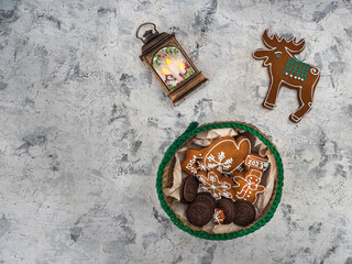 Christmas gingerbread cookies with colorful glaze and a Christmas flashlight
