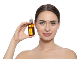 Fototapeta premium Young woman with bottle of essential oil on white background