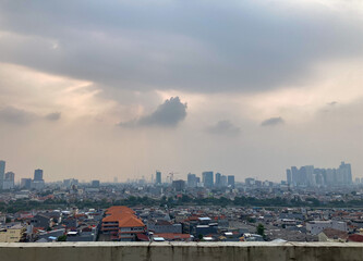 View of Jakarta city from the rooftop during cloudy day