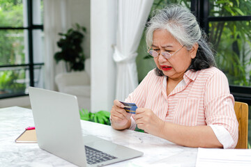 Elderly women are stressed about credit cards. Saving money to live in retirement. Concept of money management. financial planning after retirement