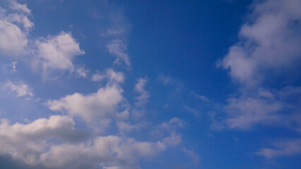 Naklejka na ściany i meble Beautiful sky with cloud in winter afternoons. Dramatic cloudy sky