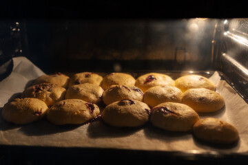 A lot of pastries in the oven are prepared for the holiday table, Delicious buns of dough