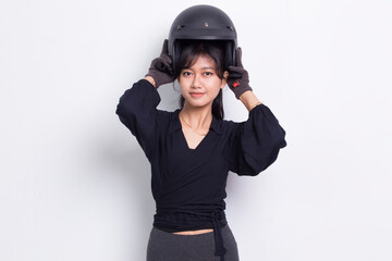 portrait beautiful asian woman wearing motorcycle helmet on white background
