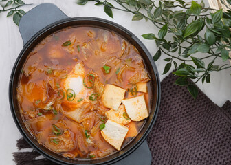 Korean spicy silken tofu stew which is called Sundubu Jjigae. Popular food in Korean Drama