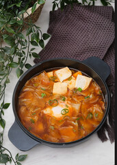 Korean spicy silken tofu stew which is called Sundubu Jjigae. Popular food in Korean Drama