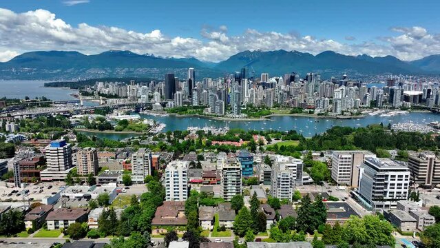 Downtown Vancouver Skyline And False Creek At Daytime From Fairview Neighbourhood in Vancouver, Canada. - aerial